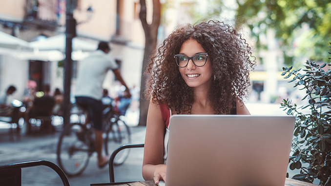 Charming,Young,Female,Caucasian,Freelancer,In,Glasses,Is,Sitting,In Community Events Blogger